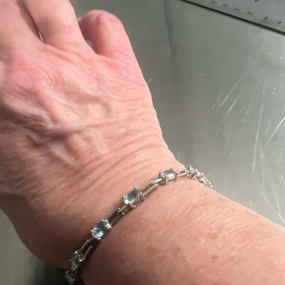 Sterling Silver & Light Blue Topaz Tennis Bracelet - Picture 3 of 5